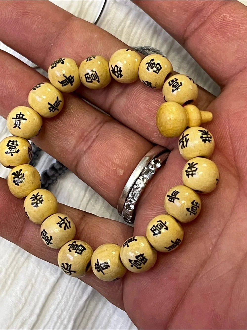 Yellow Bead Stretch Bracelet with Black Flower Accents